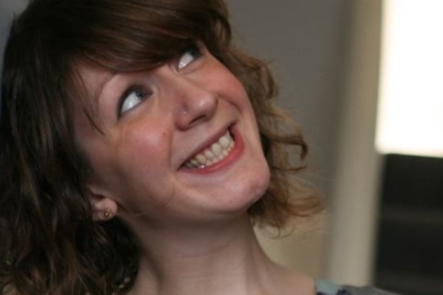 image of Becky Dixon smiling and looking upwards.